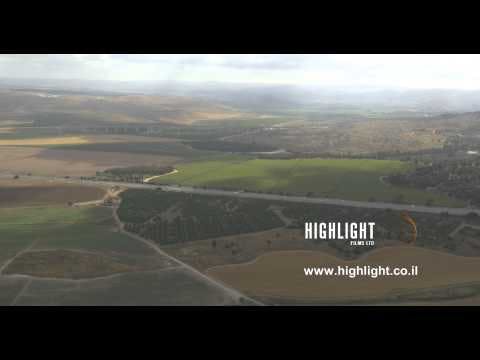AJ4K 074 Aerial 4K footage of Jerusalem: Road 1 in central Israel with green fields