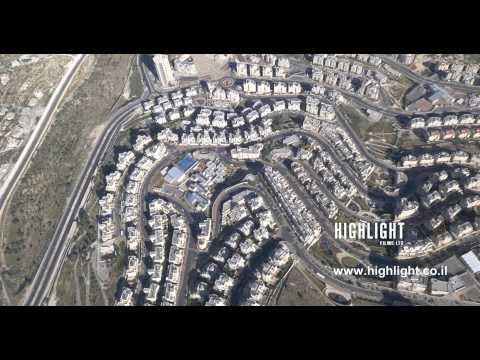 AJ4K 038  - Aerial 4K footage of Jerusalem: Neighborhood of Har Homa in south Jerusalem