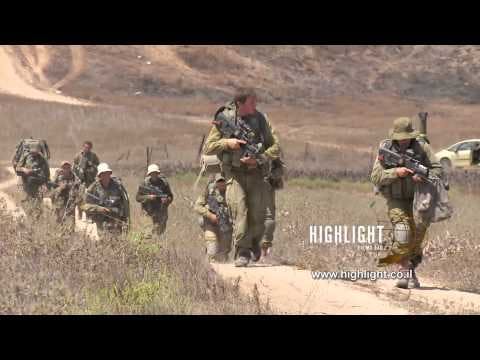 TZE 008 IDF Operation Protective Edge 2014: Footage of troops moving out of Gaza
