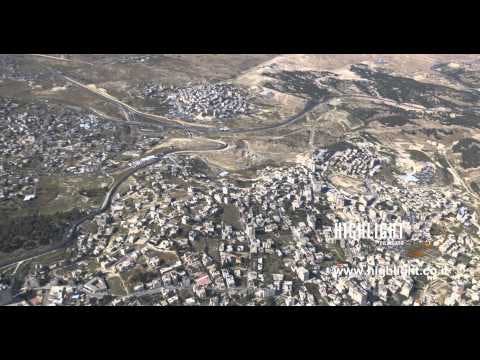 AJ4K 031 - Aerial 4K footage of Jerusalem: The separation wall in south-east Jerusalem