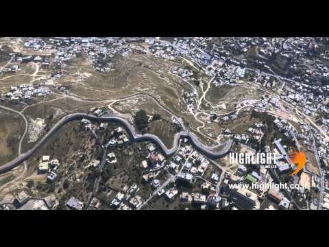 AJ4K 028 - Aerial 4K footage of Jerusalem: The security wall east of Jerusalem