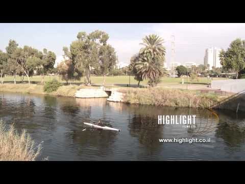 T 047 Israel Footage library: Tel Aviv footage - Hayarkon brook with kayaks