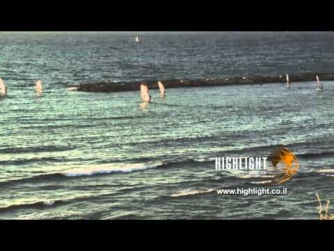 T 051 Israel Footage library: Tel Aviv footage - pan right over sailboats on the Tel Aviv coast