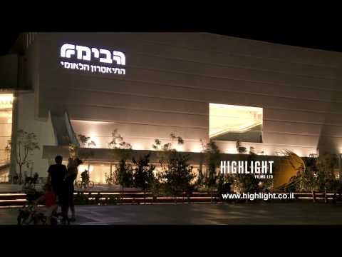 T 045 Israel Footage library: Tel Aviv footage - pan right over entrance to Habimah theatre at night