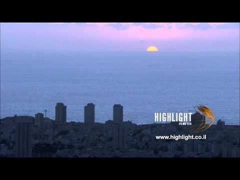 T 010 Israel Footage library: Tel Aviv footage - sunset in the sea over Tel Aviv skyline