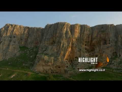 DN4K 009 G Israel stock footage: 4K drone aerial footage of Arbel cliff, drone pulling back