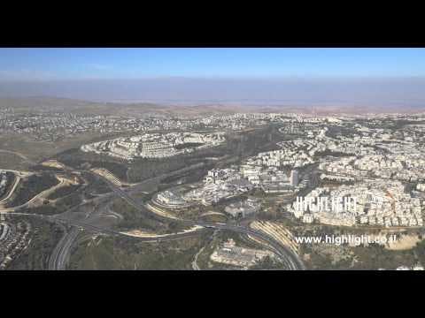 AJ4K 065 Aerial 4K footage of Jerusalem from the west: Jerusalem highways near Har Hotzvim